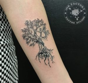 фото тату Женская татуировка цветок на лодыжке 428